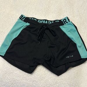 Black and teal athletic shorts